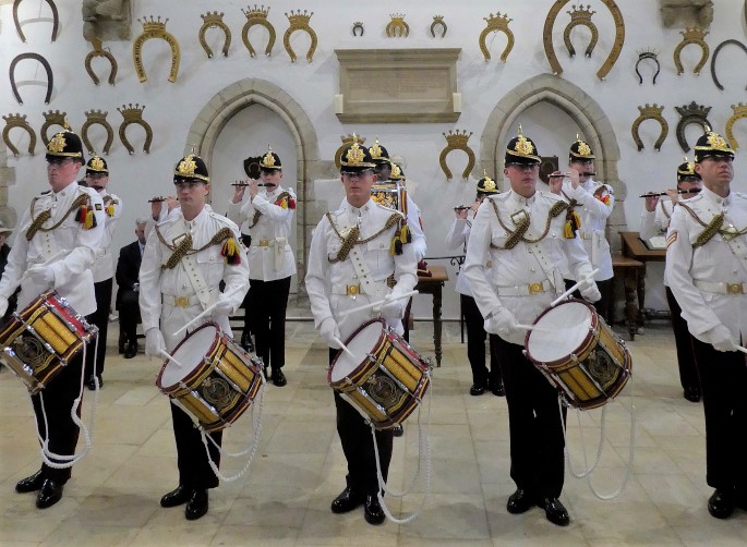 Military drummers inside the Great Hall of Oakham Castle